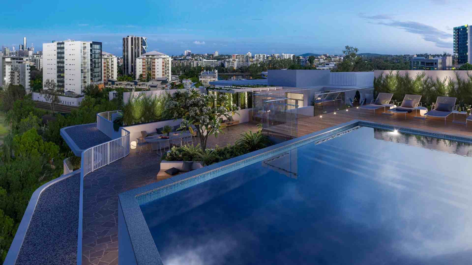 rooftop pool with bbq pit and lounge chairs