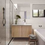 shower and bath with black faucets