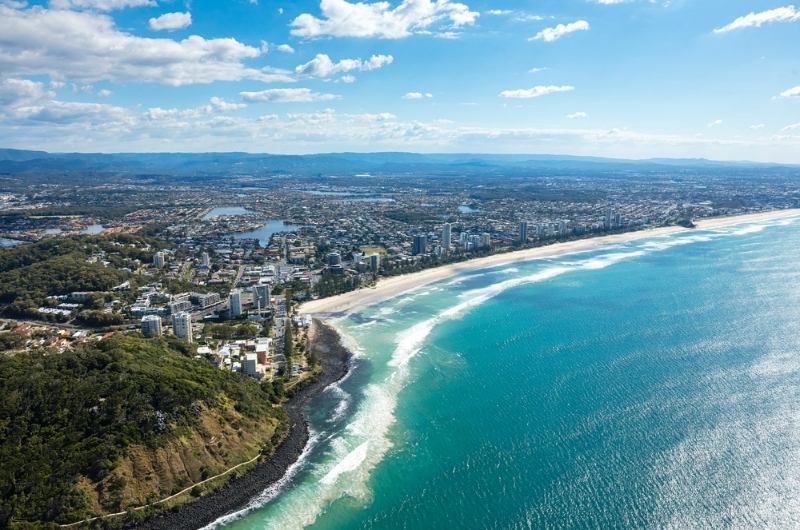 drone image of gold coast meets the ocean