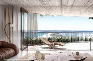 wooden lounge chair on the balcony overlooking the ocean