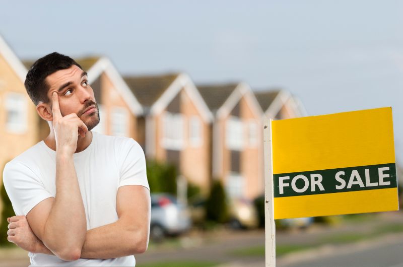 man thinking of selling a home